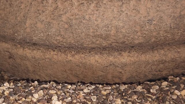 Close-Up of Woman Hand Operating Traditional Stone Grinder Chakki in India, Manual Grain Grinding Process, Rural Kitchen Tool, Authentic Village Lifestyle, Organic Food Preparation 4K Footage