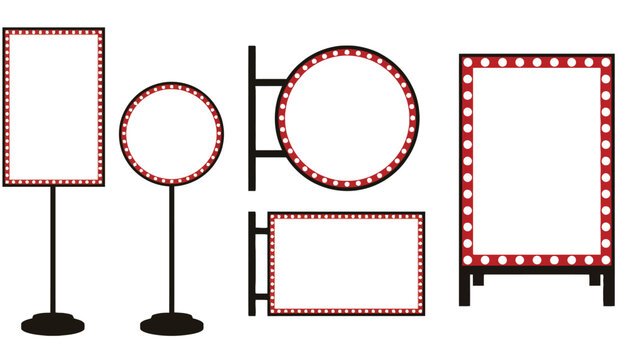 A set of blank marquee signs with red lights on stands