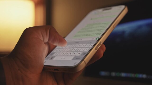 Man hands chatting and typing on smartphone macro closeup. Unrecognizable human typing text message tapping touchscreen keyboard using whatsapp application a social media