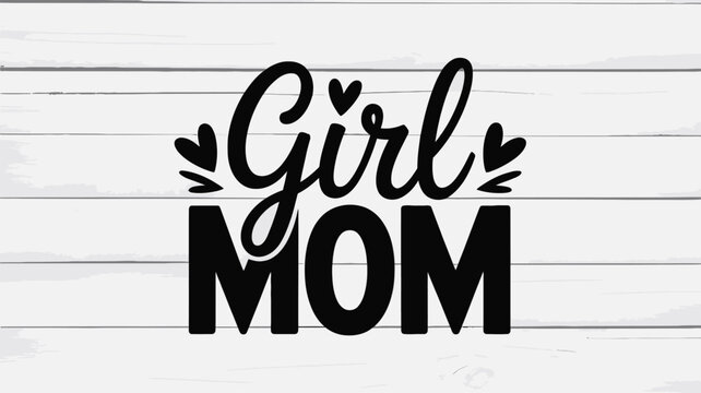 Stylized Girl Mom script with small heart accents against a light wooden plank surface