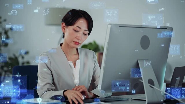 オフィスでパソコンを使う女性ビジネスパーソンとデジタルテクノロジーのコンセプトイメージ