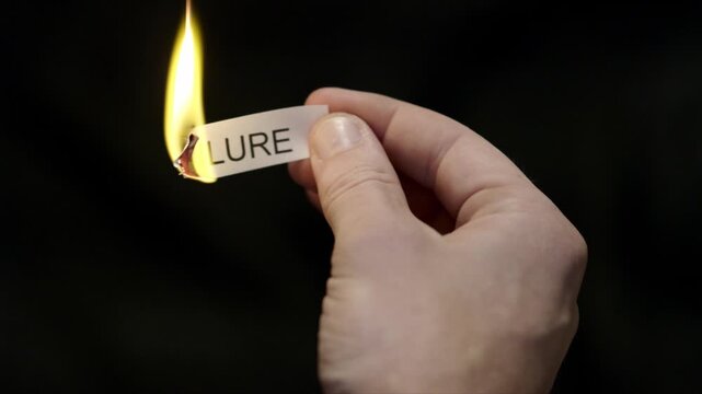 Burning Away Failure - Hand Setting Fire to Paper note Marked &ldquo;FAILURE&rdquo;, Powerful Release of Criticism, Guilt and Shame, Dark Cinematic Close-Up. Mental health, therapy