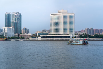 Guangzhou Pearl River Waterfront with Modern Hotel and Skyline © NguyenNhat