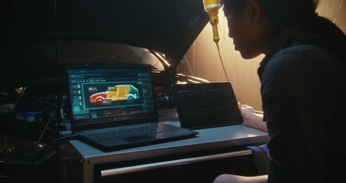 Female Technician Analyzing Vehicle Digital Twin on Laptop, With 3D Models Showing Internal Component Status. Simultaneously, Woman Interacts With Tablet to Track Performance Curves and System Logs.