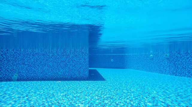 Underwater view of a tiled pool
