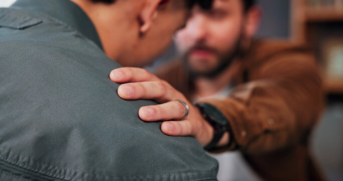 Support, therapist and hand on shoulder, men and compassion for loss, empathy and grief. Sad, help and counseling in office, talking and comfort for emotions, kindness and healing with mental health