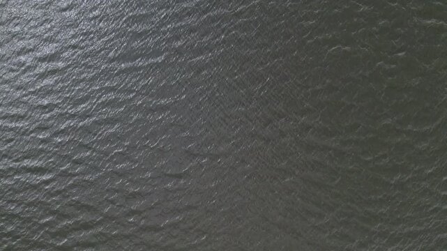 Moving water texture with wave pattern.