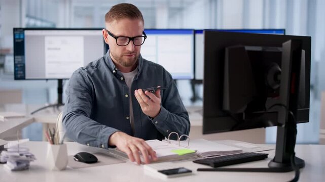 Young Man Scans Invoice Documents