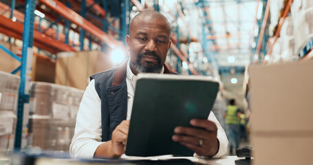 Fototapeta premium Logistics, man and scroll on tablet in warehouse for order tracking, shipping status or distribution. Supply chain, mature manager or tech for stock control, delivery schedule or inventory management