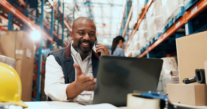 Man, phone call and laptop at warehouse for logistics with talk, schedule or review for inventory management. Person, happy and smartphone with checklist, computer and supply chain at storage plant