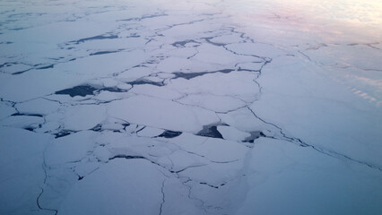 Ice floating on the ocean surface. Ice breaking texture on sea. Ice covering cold seawater. Ice drifting. © Volodymyr