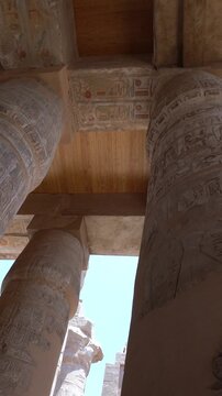 Luxor, Egypt -MARCH 10, 2026: Colossal egyptian columns with hieroglyphs at karnak temple