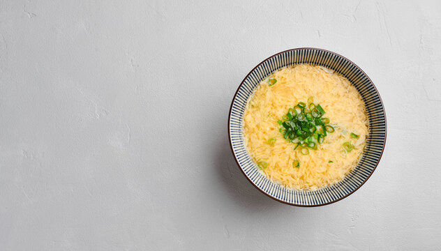 Chinese egg drop soup, top view, copy space