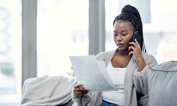 Black woman, reading and document with phone call at house to contact bank for billing inquiry. Female person, mobile and customer support for finance mistake, debt discussion and recurring payment