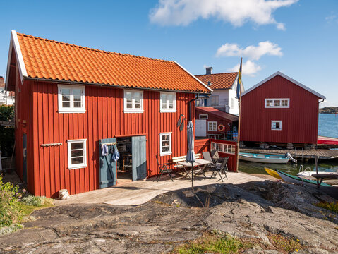 Red wooden waterfront house on Gullholmen island in Bohusl&auml;n Archipelago, west coast Sweden