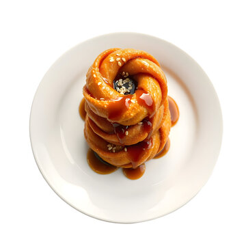 Golden Peruvian picarones doughnut rings drizzled with sweet chancaca syrup