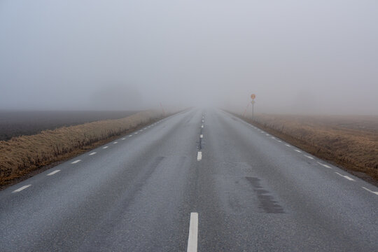 Poor visibility due to mist over rural road