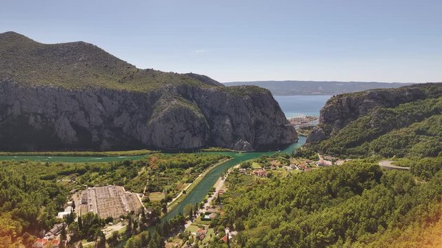 Aerial drone shot of Mila Gojsalic monument with panoramic view over Omis.