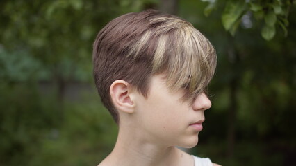 Teenage Boy Profile Portrait Outdoors in Nature, have fun and enjoy © vla