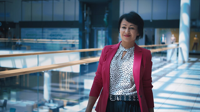 Confident Businesswoman Standing in Modern Office Interior, have fun and enjoy