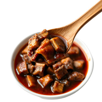 Traditional Filipino dinuguan pork blood stew with offal, chilies and vinegar served with puto
