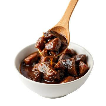 Traditional Filipino dinuguan pork blood stew with offal, chilies and vinegar served with puto