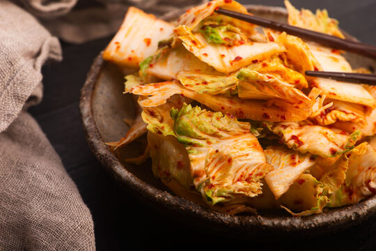 Korean Geotjeori Fresh Kimchi Salad Served on Handmade Ceramic Plate