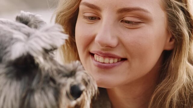 Relax, happy and woman with puppy with smile for bonding, relationship and trust on weekend together. Friendship, pet owner and girl with dog for comfort, cuddle and chill for adoption, love and care