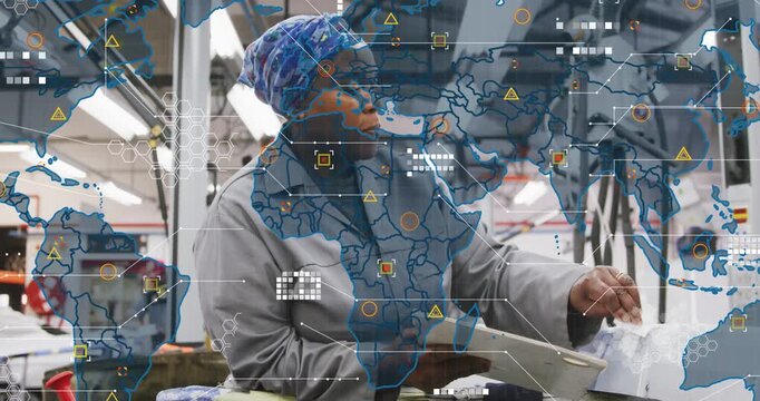 Inspecting tech adjusting white part at plant bench with docs light-gray coat blue wrap map overlay
