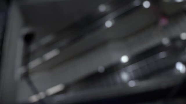 Night cityscape escalators with people blur picture