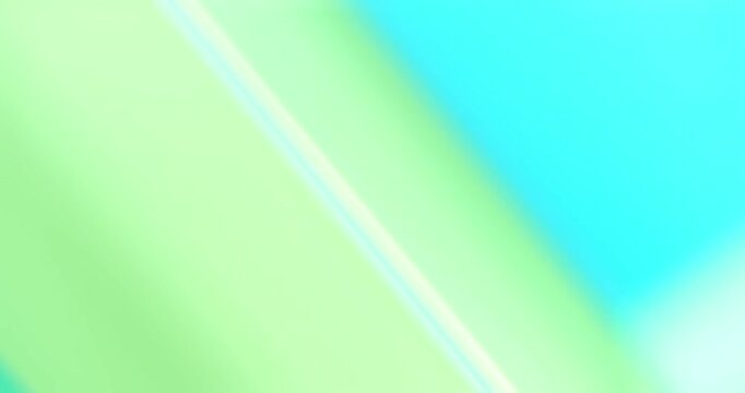 Colorful Gradient Stripes. Abstract video with smooth flowing bands in blue, pink, orange and yellow gradients.Lots of different colors and tones. In the style of light leaks - real effect.