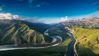 Fototapeta premium Curved River Passing Through A Dramatic Mountain Landscape Seen From Above