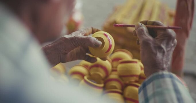 Busy street market where pooja items are made, painted on mud pots, and sold, showcasing vibrant Indian culture, religious rituals, and traditional craftsmanship