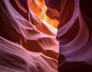 Obraz premium Swirling, naturally sculpted rock formations, illuminated by sunlight