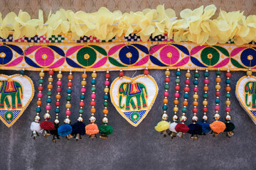 Naklejka premium Brightly colored decorative elements during Deepavali celebration with unique patterns and textures