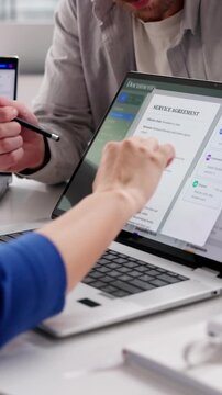 Archivist Carefully Organizing Records On Computer