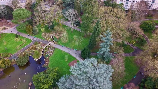 Jardin des Plantes botanical garden in Angers showing pond, paths and trees including Cedrus atlantica and Pinus pinea in Maine and Loire region France, aerial view