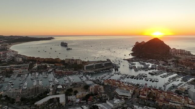 Orbit Shot Of Boats Anchored In Marina At Sunrise In Los Cabos Baja California, Mexico