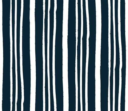 Seamless pattern with hand drawn vertical black and white stripes, expressive brush strokes and rough textured edges. Modern minimalist linear design