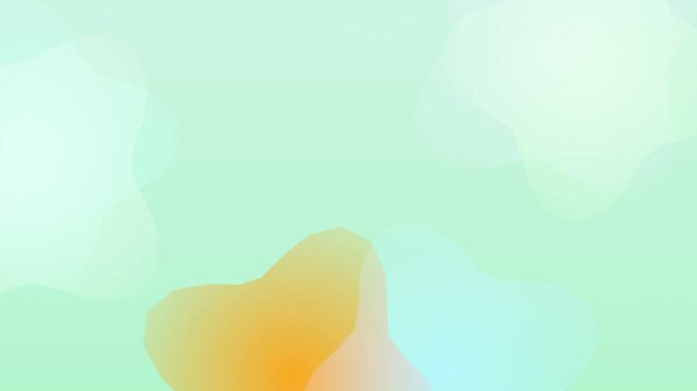 Blurry orange object on green background.