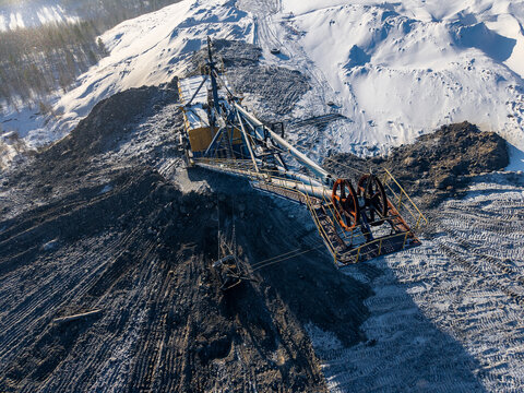 Open pit mine coal, Work of walking excavator for excavation overburden removal, Aerial view
