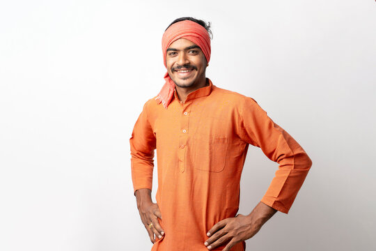 Young indian farmer giving happy expression on white background