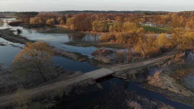 Orbit Around Wooden Bridge Along Diagonal Axis at Golden Hour