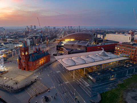 Aerial drone image of the Senedd Welsh Parliament building in Cardiff Bay, Wales UK at sunset