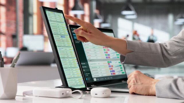 Medical Coder Carefully Reviews Data On Computer Screen