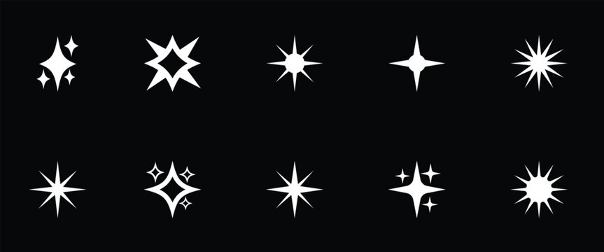 Bright abstract transparent sparkle effects on a dark background. Decorative sparkle icon for highlights new features and shine effect. Vector illustration.