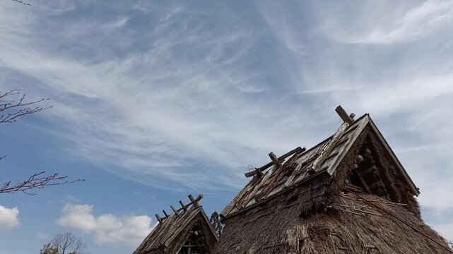 Ancient Jomon and Yayoi Period Houses with Copy Space in Sky, Traditional Japanese Village Scene