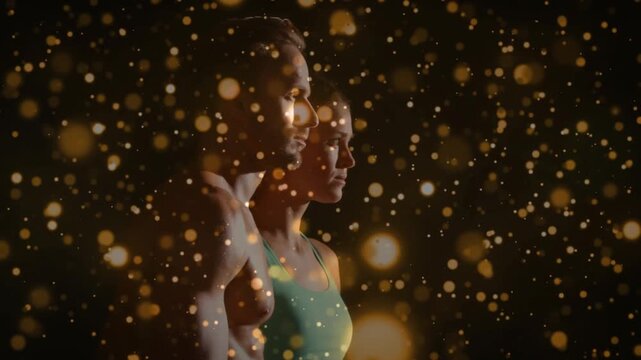 Female and male posing, lighting reveal exposing faces, warm bokeh drifting across them for fitness