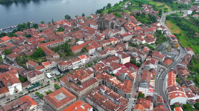  Aerial panoramic view beside the old town of  the city Tui in Spain on a cloudy summer noon.