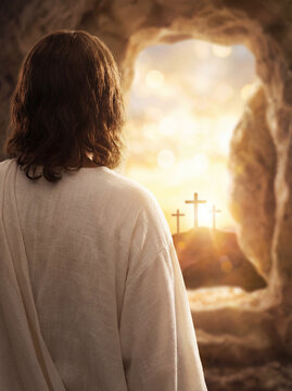 The risen Jesus looking out from the empty tomb at sunrise, with crosses
